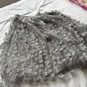 Fun and flirty skirt with embellished floral design